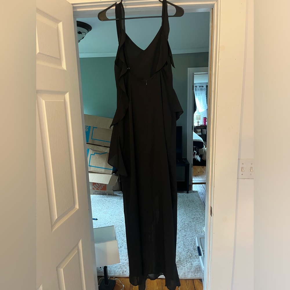 Sleeveless black maxi dress.
